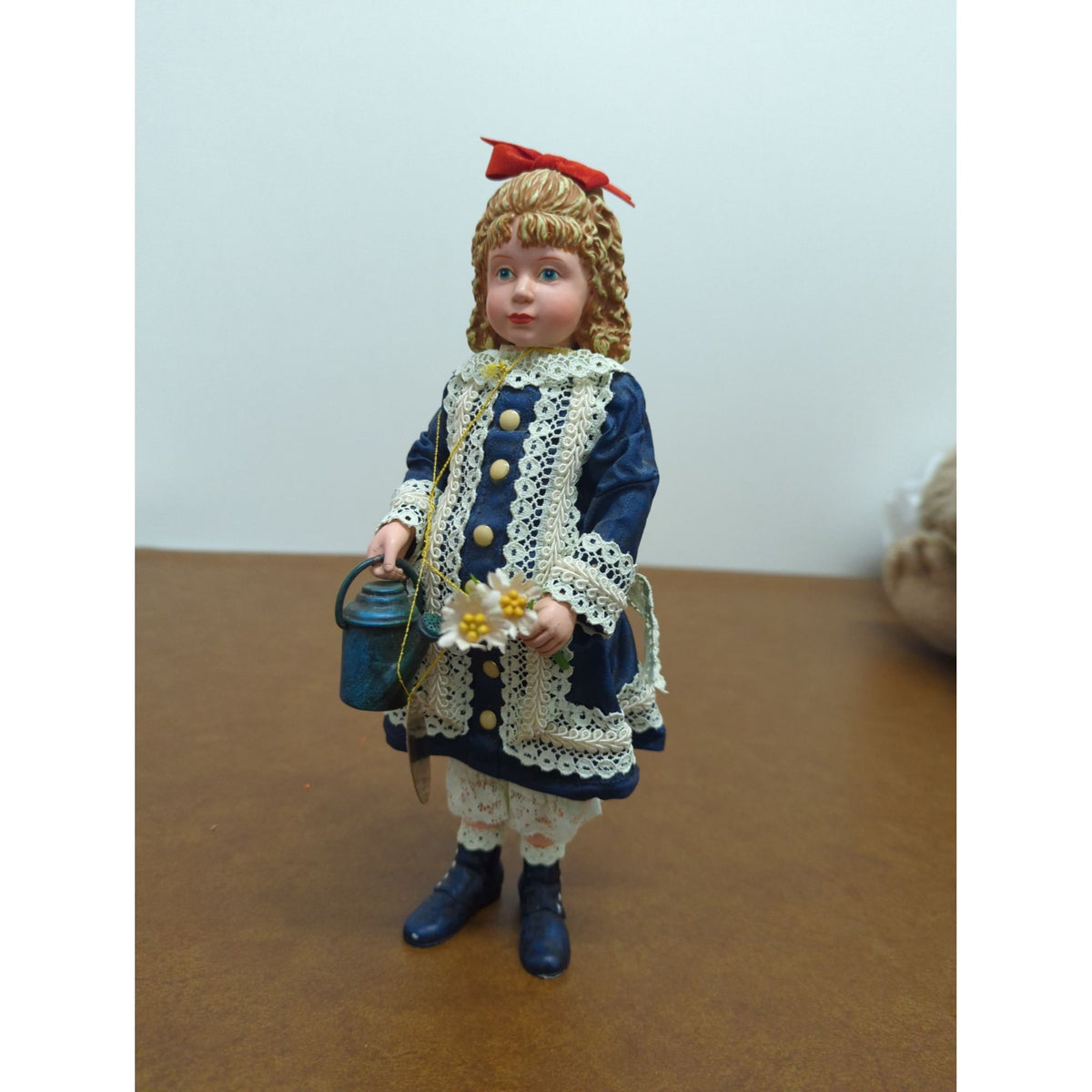 Porcelain Doll In Blue Dress With Lace Red Bow & Watering Can Accents 10 Inches