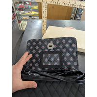 Vera Bradley Black Quilted Crossbody Bag With Floral Interior Lining Adjustable Strap And Metal Turn-Lock Closure