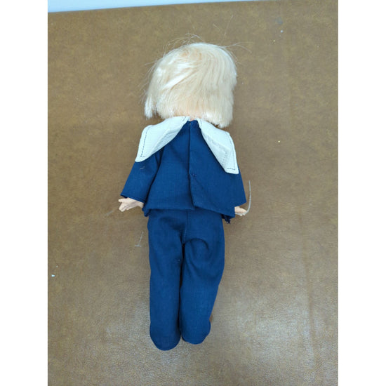 Vintage Blonde Doll In Blue Sailor Outfit With Red Bow 12 Inches Tall Sleepy Eyes Cloth Body Pre-Owned