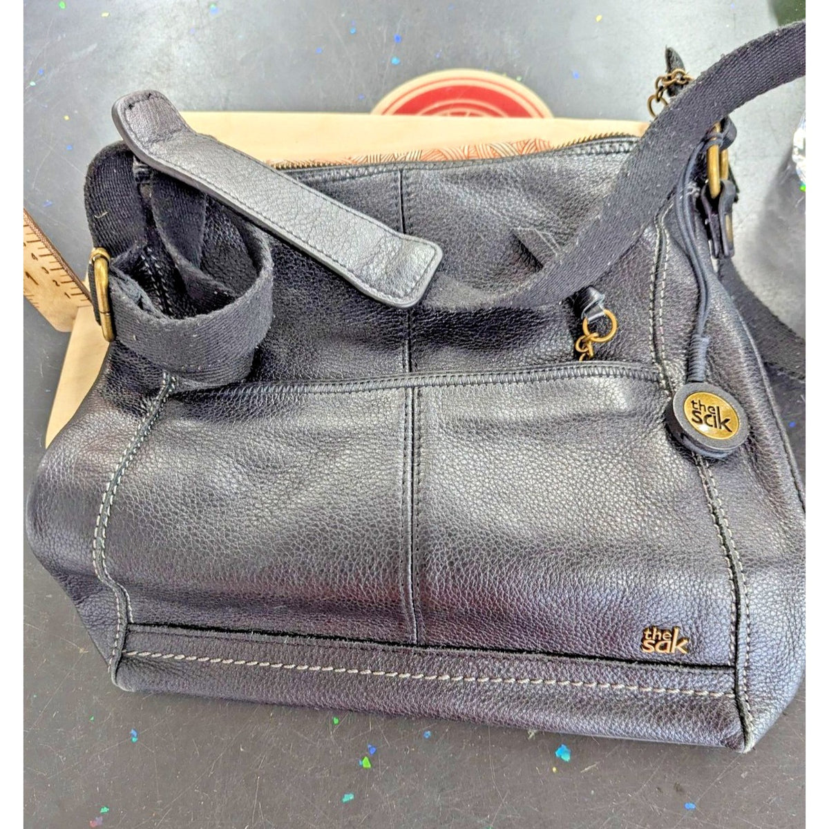 The Sak Black Leather Shoulder Handbag With Unique Patterned Lining