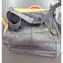 The Sak Black Leather Shoulder Handbag With Unique Patterned Lining