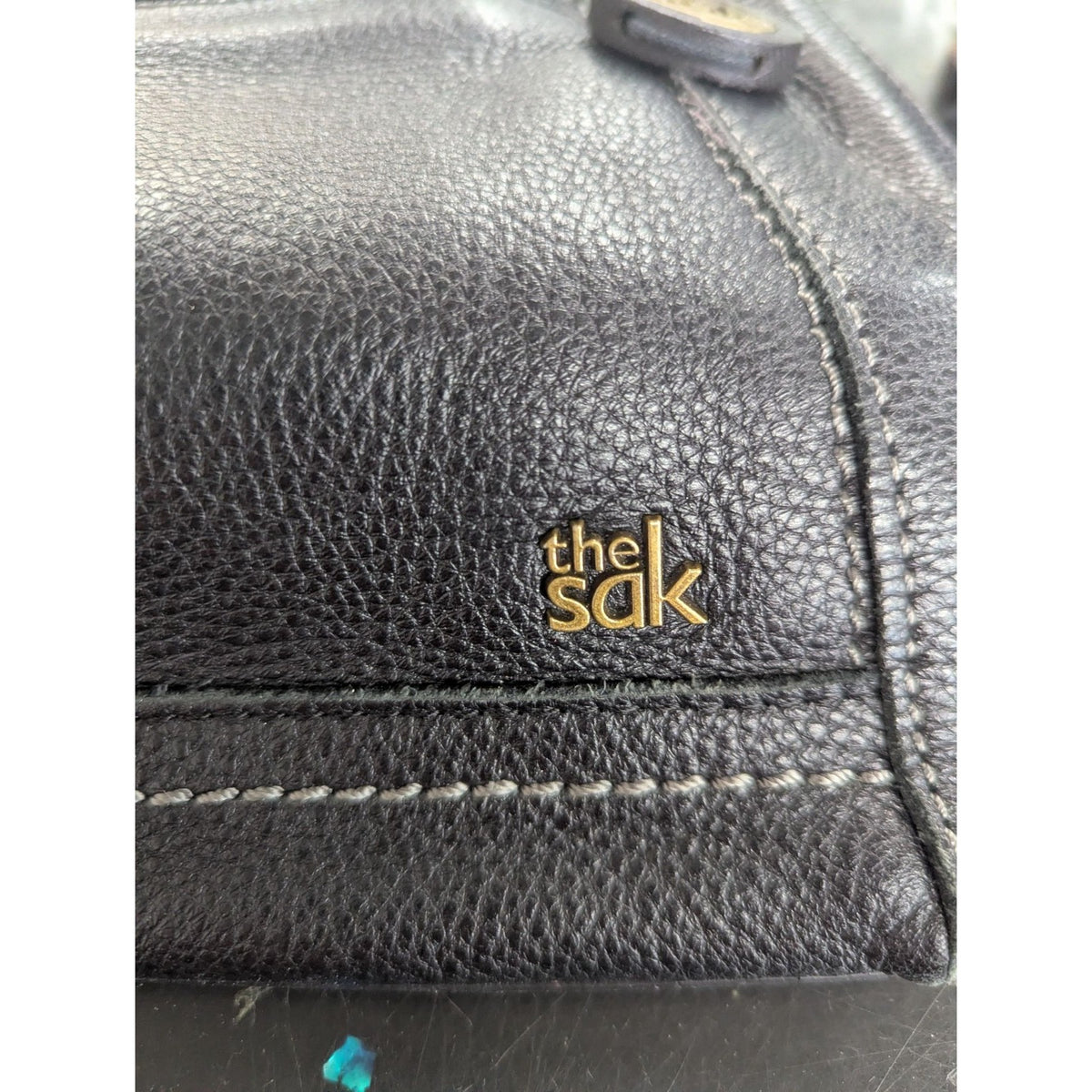 The Sak Black Leather Shoulder Handbag With Unique Patterned Lining