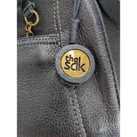 The Sak Black Leather Shoulder Handbag With Unique Patterned Lining