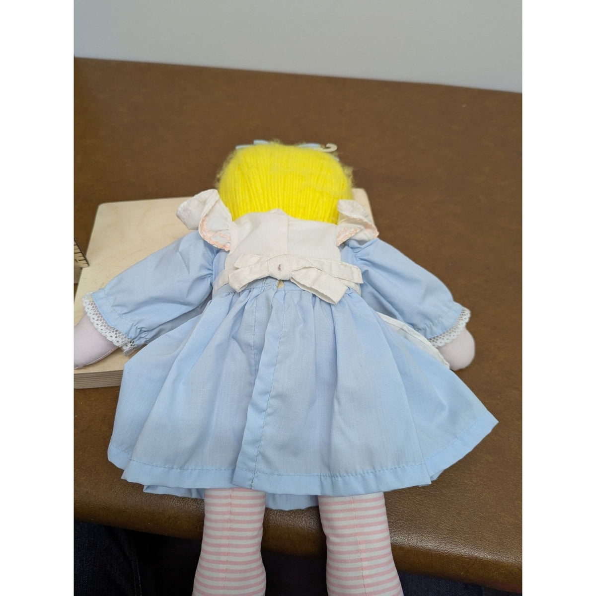 Vintage House Of Haten Blue & White Embroidered Flower Doll With Yellow Yarn Hai