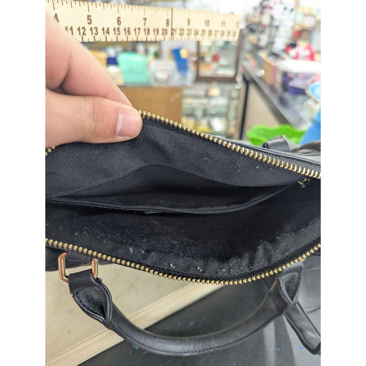 Black Quilted Leather Handbag With Gold Hardware V Logo