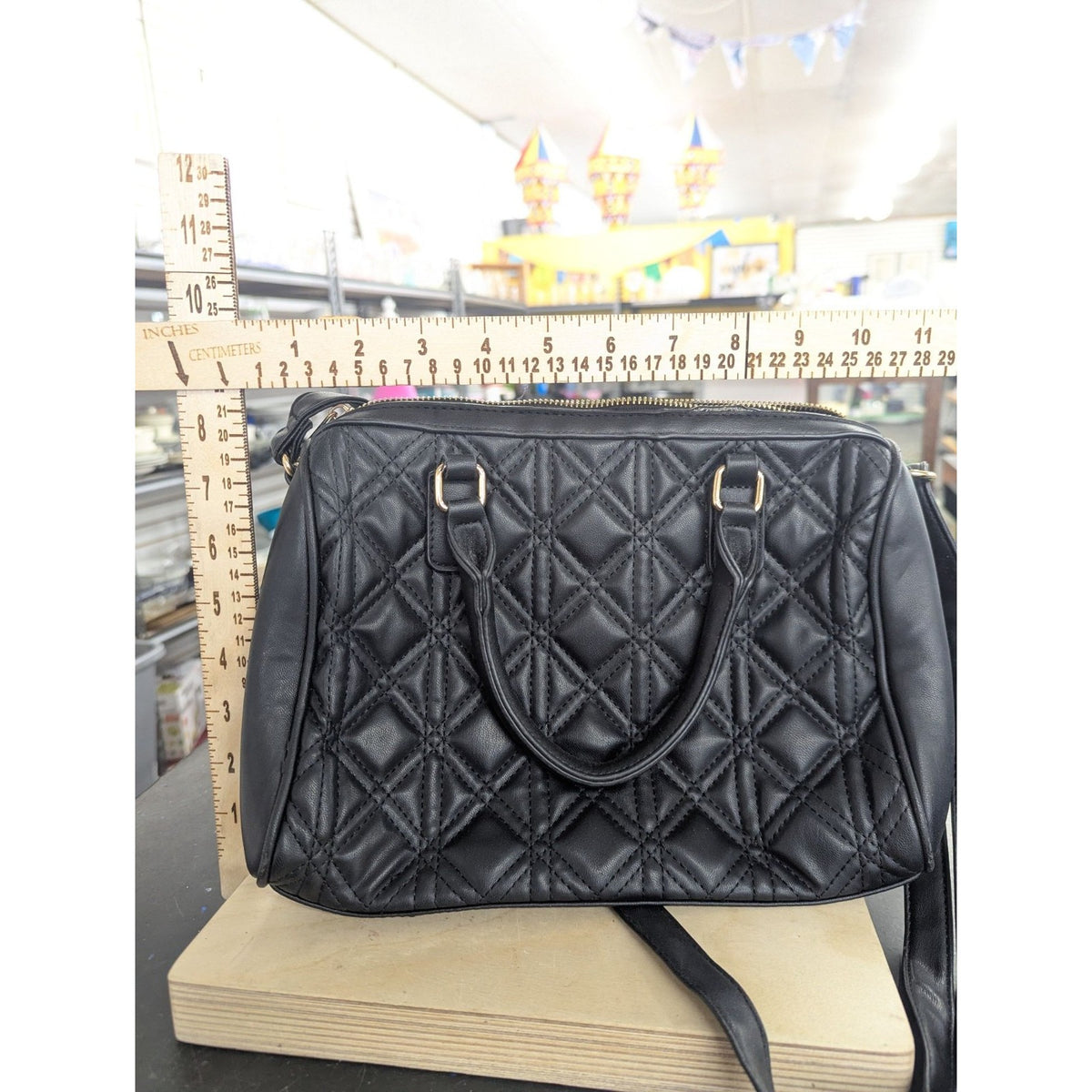 Black Quilted Leather Handbag With Gold Hardware V Logo