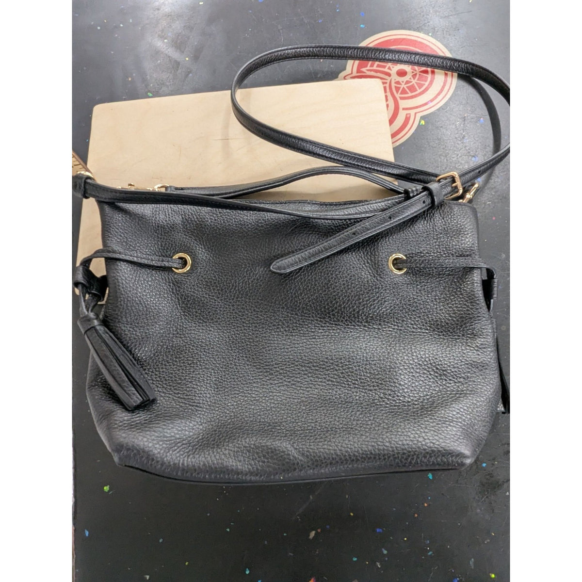 Black Leather Coach Crossbody Bag With Tassel & Gold Hardware