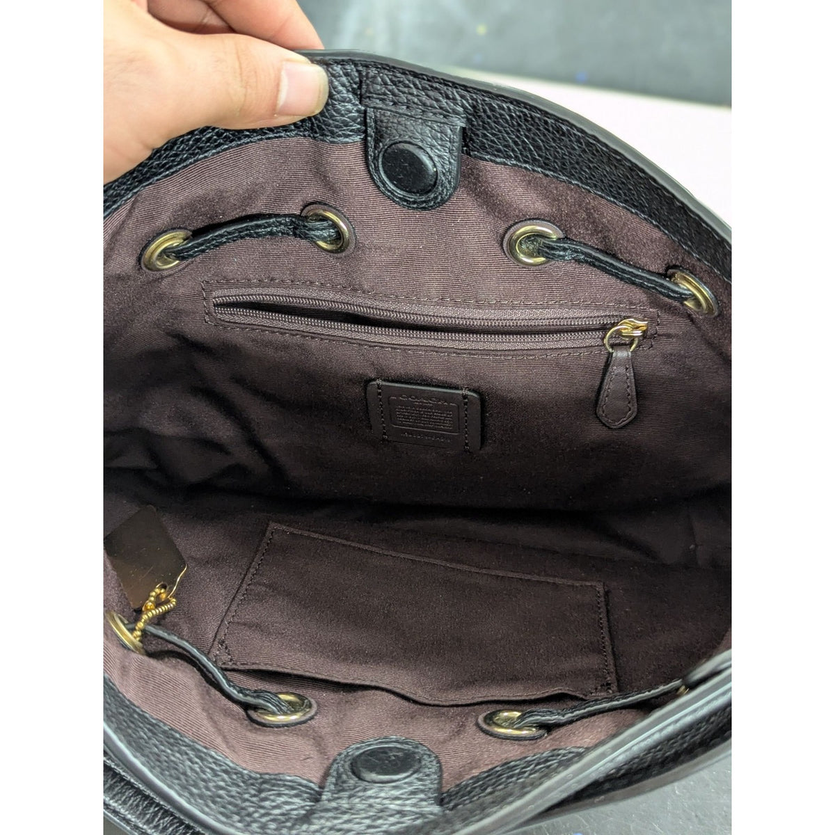 Black Leather Coach Crossbody Bag With Tassel & Gold Hardware