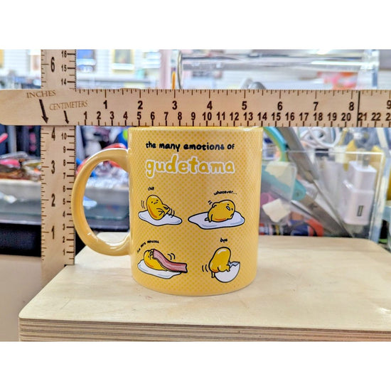 Gudetama Yellow Ceramic Mug Featuring "The Many Emotions" Design 14 Oz Safe For