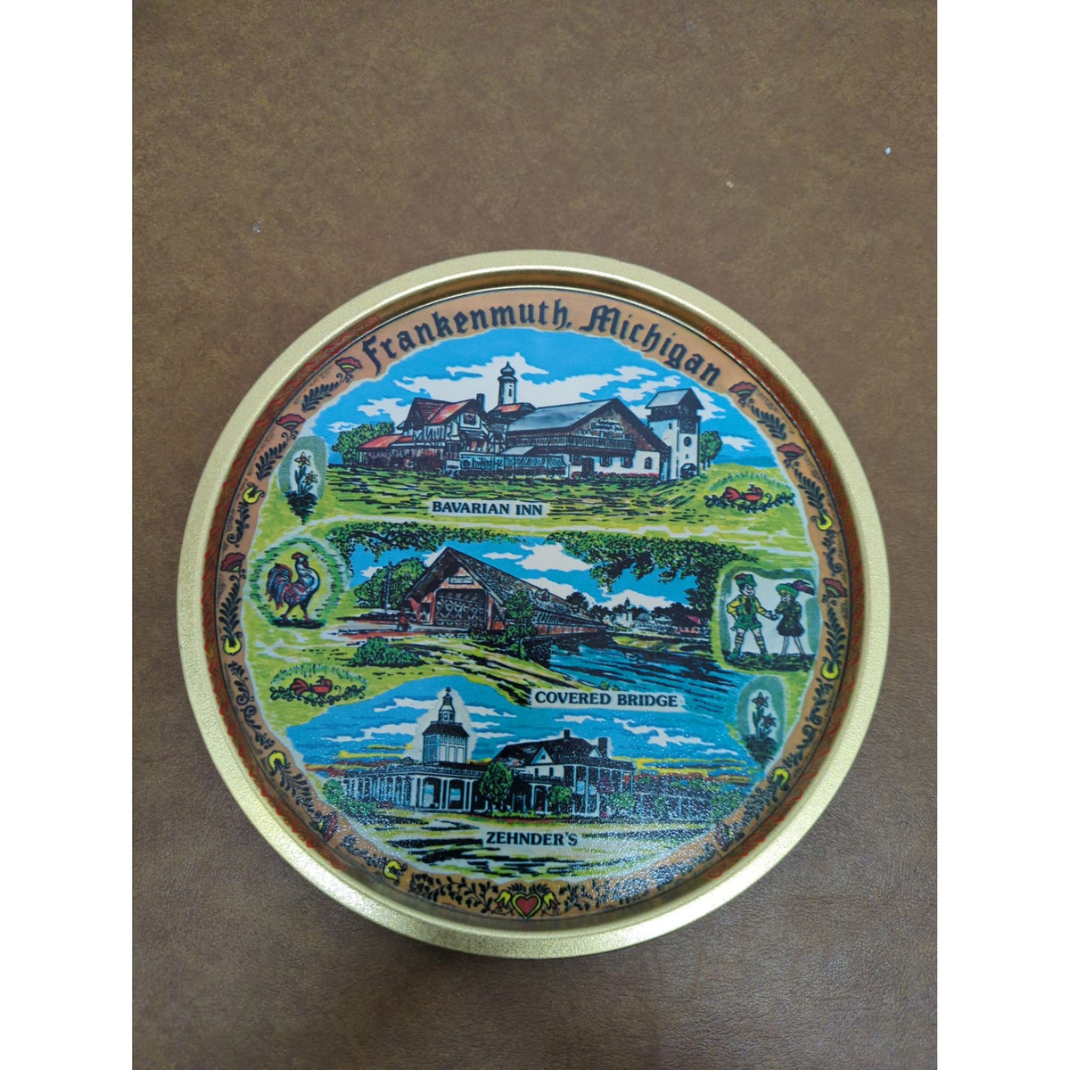 Frankenmuth Michigan Souvenir Tin With Bavarian Inn & Covered Bridge Design 9 Inches Round