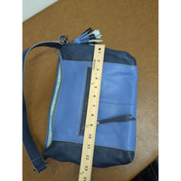 The Sak Leather Shoulder Bag In Blue & Navy With Tassel Accents And Zip Closure 14" X 10".