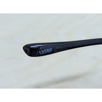 Sleek Black Eyeglasses With Silver Accent Frames Blue Light Blocking