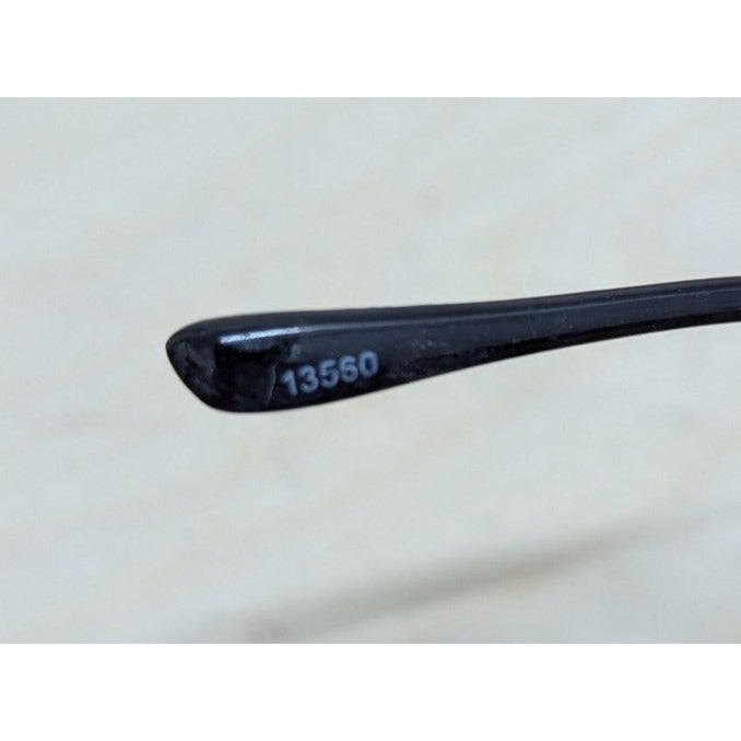Sleek Black Eyeglasses With Silver Accent Frames Blue Light Blocking