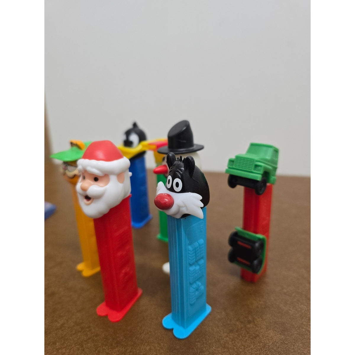 Vintage Pez Dispensers Lot Of 7 Featuring Garfield Santa Daffy Duck & More