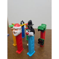 Vintage Pez Dispensers Lot Of 7 Featuring Garfield Santa Daffy Duck & More