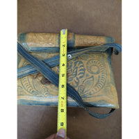 Vintage Tooled Leather Crossbody Bag With Floral Design Adjustable Strap And Secure Buckle Closure - Approx 10"x7".