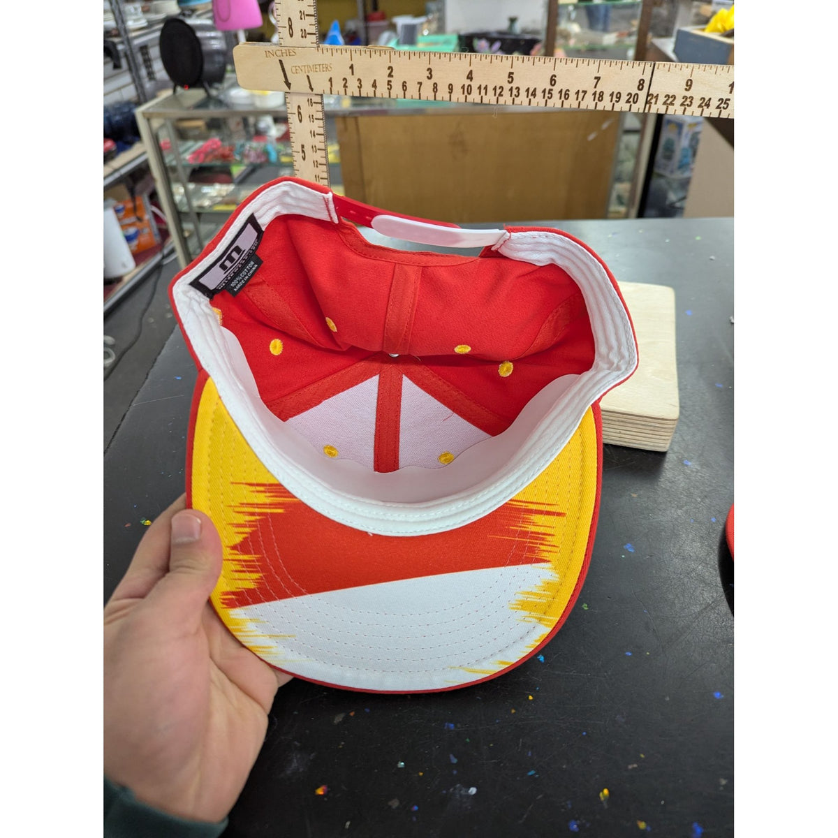 Red Snapback Hat With Embroidered "D" Logo & Yellow Accents Adjustable Fit