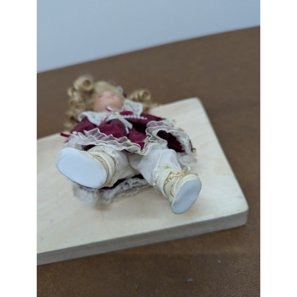 Porcelain Blonde Doll In Burgundy Lace Dress With Accessories
